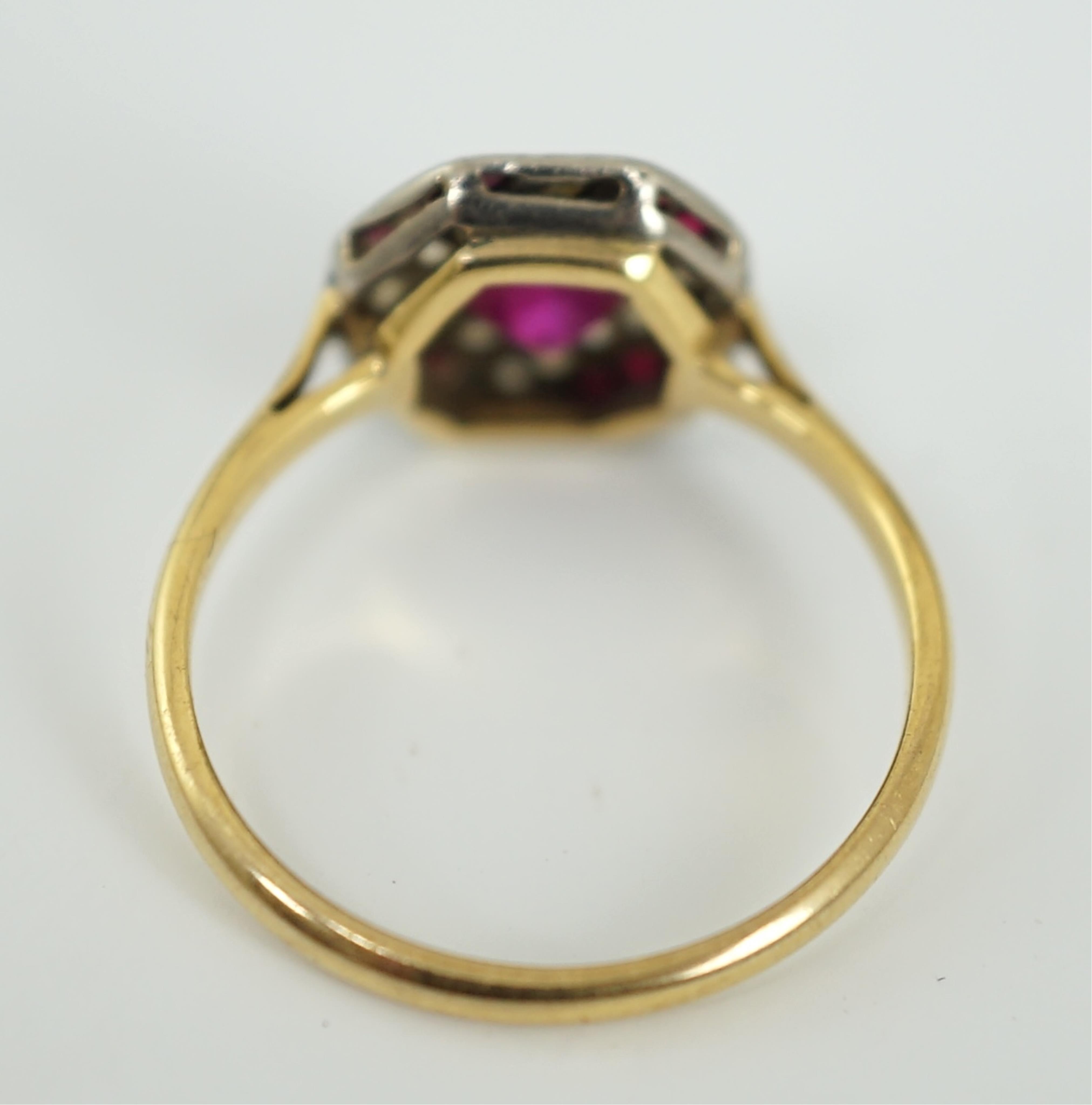 An Art Deco 18ct and platinum, ruby and diamond set octagonal cluster ring